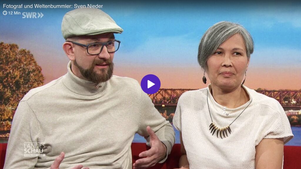 Sven Nieder und Laali Lyberht - Zwei Personen im Fernsehen diskutieren.
