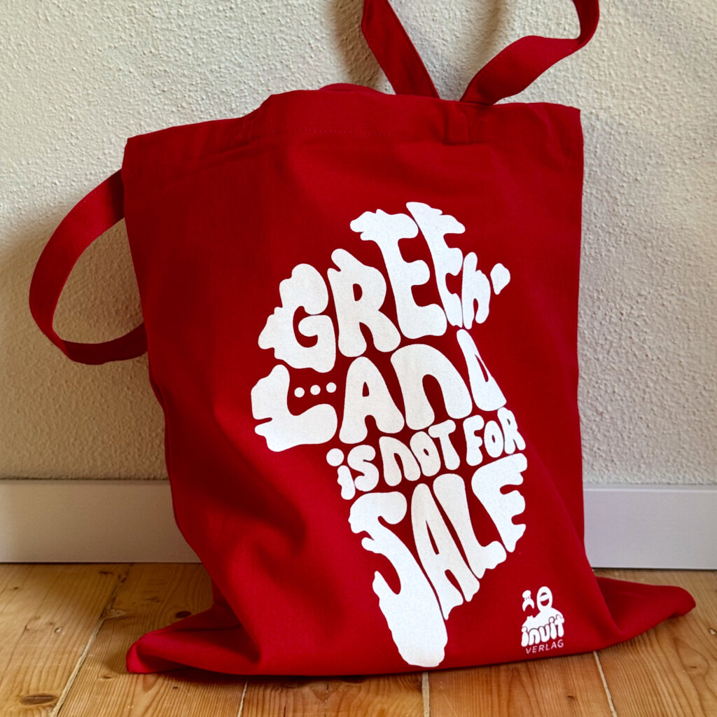 Greenland is not for sale. Rote Tasche mit Aufschrift 'Grönland nicht zu verkaufen'.